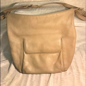 Stone Mountain tan leather purse.